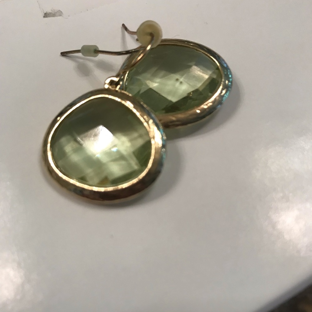 Gold and light green faceted earrings.